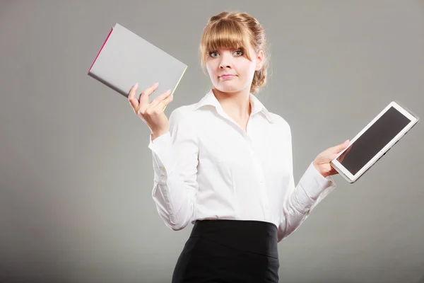 Woman holding ebook and book. Modern education. — Stock Photo, Image