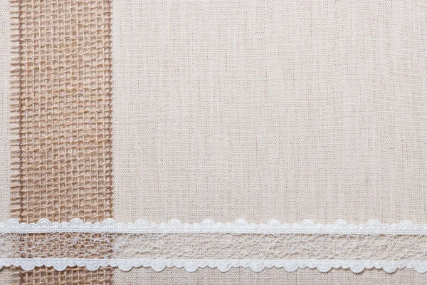 Lace frame on linen cloth background — Stock Photo, Image
