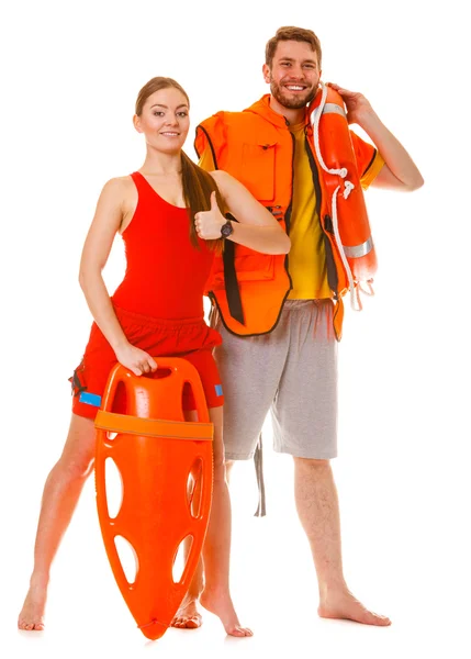 Lifeguards with rescue ring buoy and life vest. — Stock Photo, Image