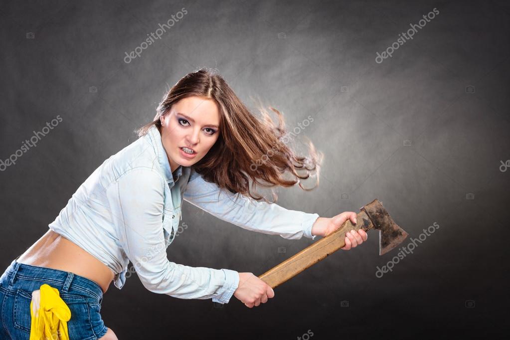 Woman holding axe finger pointing Woman holding axe — Stock Photo