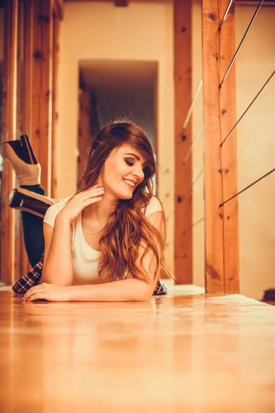 Woman laying on floor — Stock Photo, Image