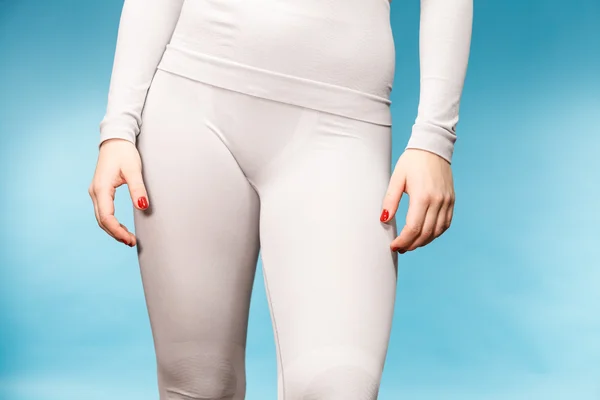 Woman in thermal underwear top ang leggings — Stock Photo, Image