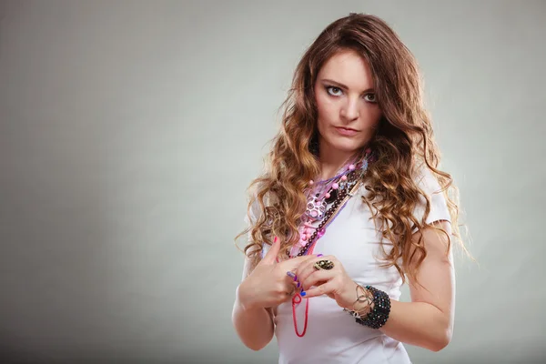 Pretty woman with jewelry necklaces ring bracelets — Stock Photo, Image