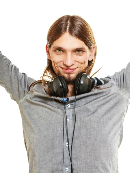 Hombre con auriculares escuchando música. Ocio . — Foto de Stock