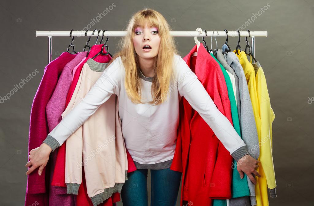 Pretty Woman Between New Clothes Stock Photo C Voyagerix 105158114