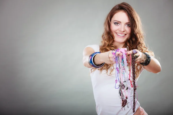 Happy woman with jewelry necklaces ring bracelets — Stock Photo, Image