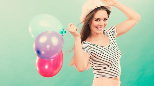 Happy girl playing with colorful balloons. — Stock Photo, Image