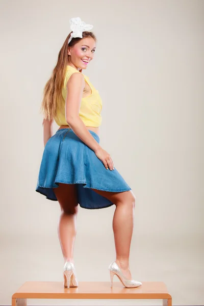 Woman dancing on table. — Stock Photo, Image