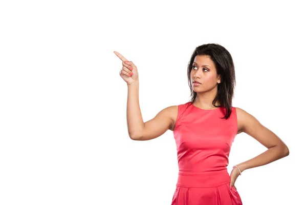 Pretty woman pointing at empty blank copy space. — Stock Photo, Image