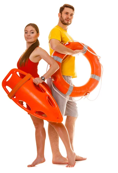 Lifeguards with rescue and ring buoy lifebuoy. — Stock Photo, Image