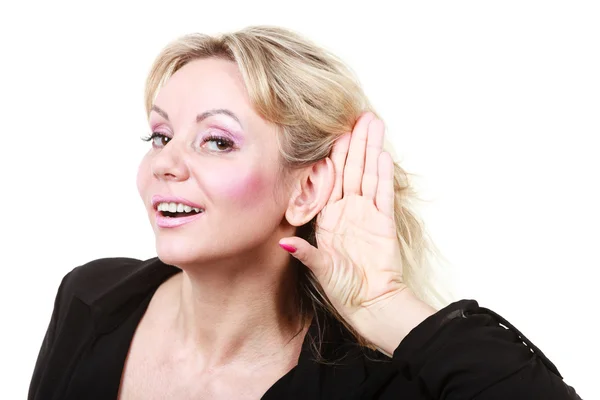 Blonde woman making listening gesture — Stock Photo, Image