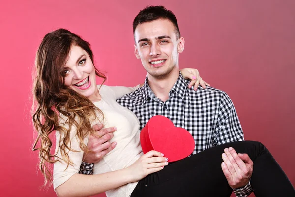 Happy romantic couple with heart — Stock Photo, Image