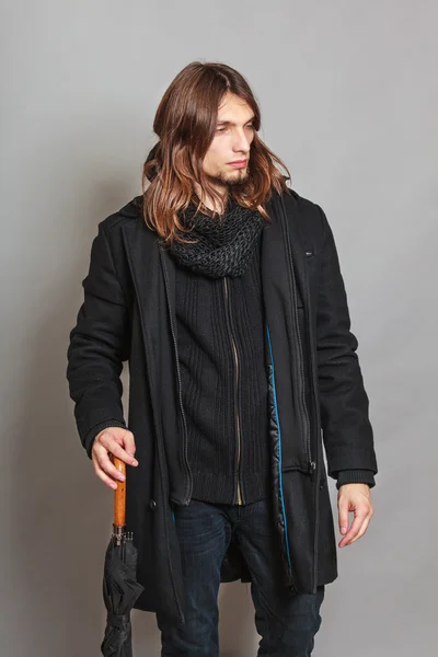 Handsome fashion man portrait wearing black coat. — Stock Photo, Image