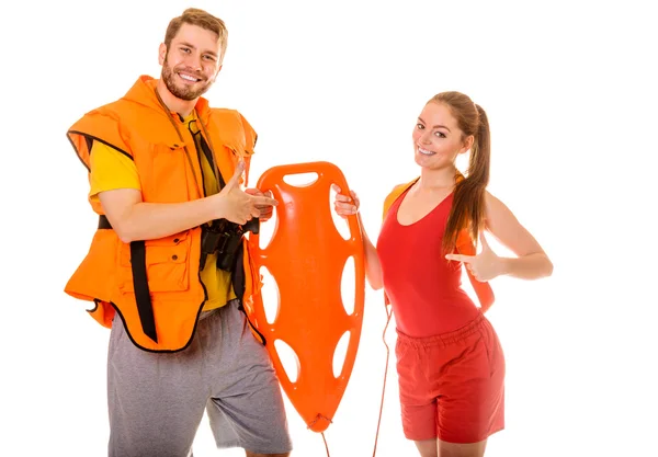 Lifeguards in life vest with rescue buoy. — Stock Photo, Image