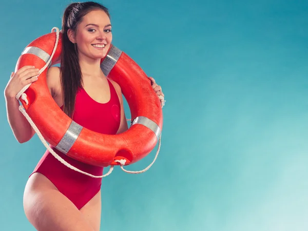 Lifeguard woman on duty with ring buoy lifebuoy. — Stock Photo, Image