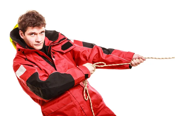 Young man pulling rope. — Stock Photo, Image