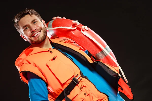 Lifeguard in life vest with ring buoy lifebuoy. — Stock Photo, Image