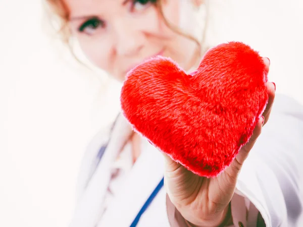 Female doctor with heart. — Stock Photo, Image