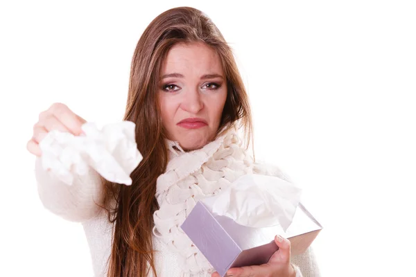Girl with fever sneezing in tissue — Stock Photo, Image