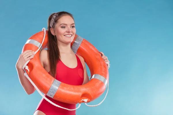 Happy lifeguard with ring buoy — Stock Photo, Image