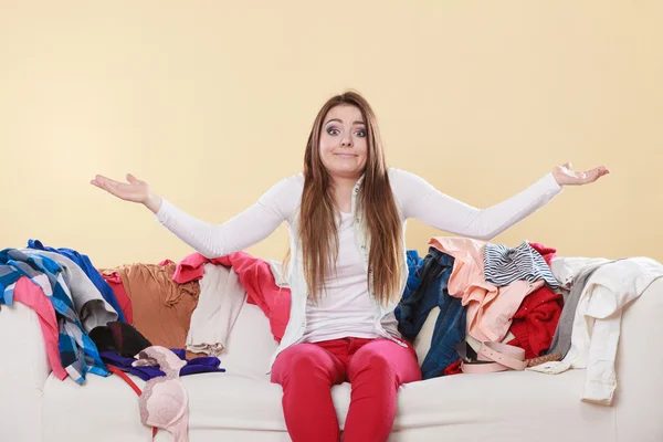 Helpless woman sitting on sofa — Stock Photo, Image