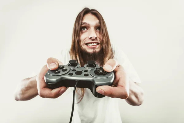 Hombre estresado jugando en el pad — Foto de Stock