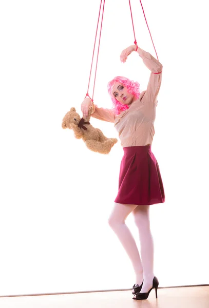 Woman girl stylized like marionette puppet on string — Stock Photo, Image