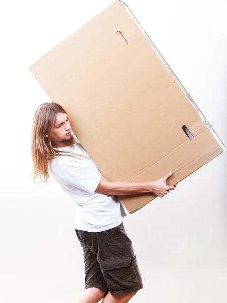 Entrega hombre sosteniendo una caja de papel . — Foto de Stock