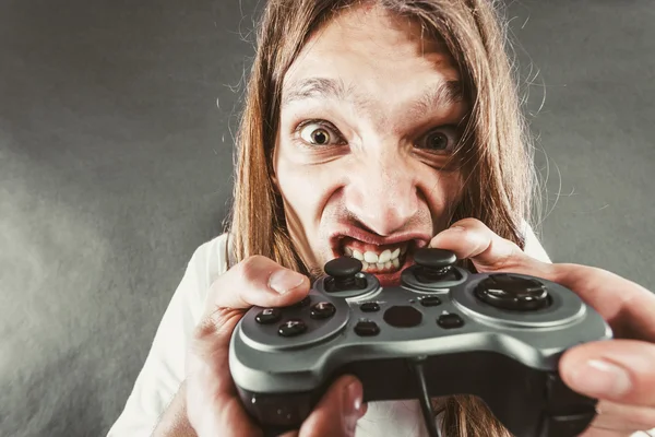 Homem estressado jogando no pad — Fotografia de Stock