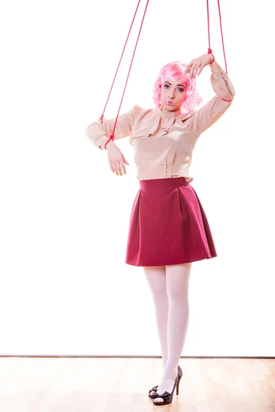 Woman girl stylized like marionette puppet on string — Stock Photo, Image