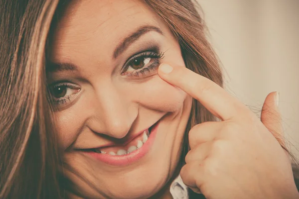 Woman touching  eyelid — Stock Photo, Image