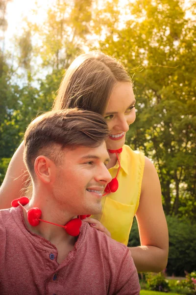 Lovers with hearts outdoor — Stock Photo, Image