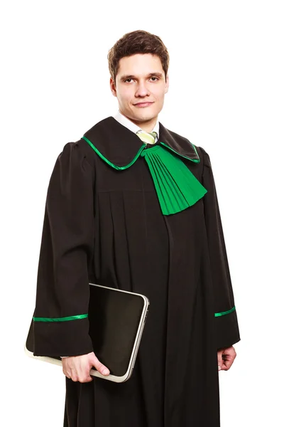 Jonge mannelijke advocaat greep gesloten laptop. — Stockfoto