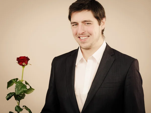 Handsome man with rose — Stock Photo, Image