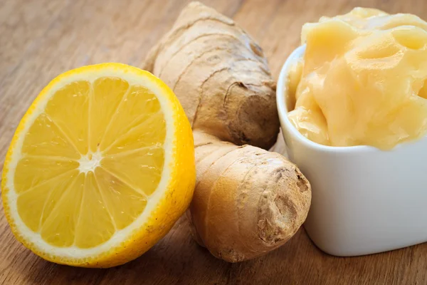 Ginger root, honey and lemon on wooden rustic table. — Stock Photo, Image