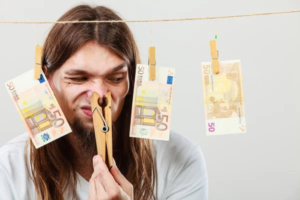 Young man sick of money — Stock Photo, Image