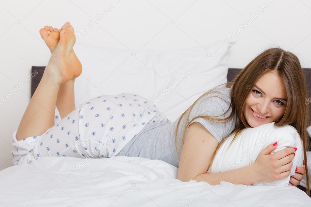 Woman lying on the bed ⬇ Stock Photo, Image by © Voyagerix #111596220