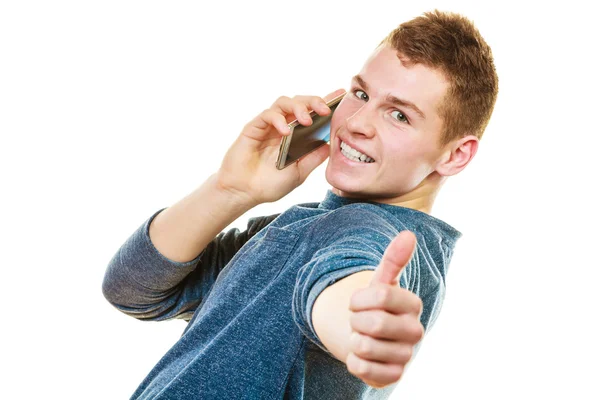 Young man talking on mobile cell phone — Stock Photo, Image