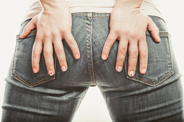 Human with hands on buttocks ass in jeans trousers — Stock Photo, Image