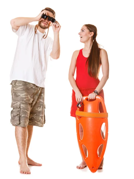 Lifeguards with rescue buoy and binoculars. — Stock Photo, Image
