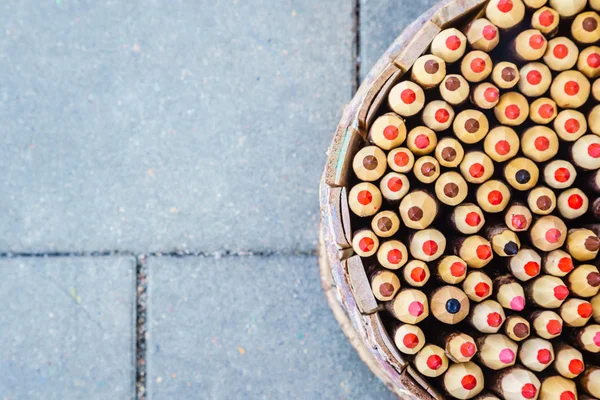 Pencils in basket pencil holder. Top view. — Stok fotoğraf