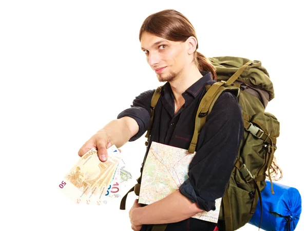 Man tourist backpacker paying euro money. Travel. — Zdjęcie stockowe