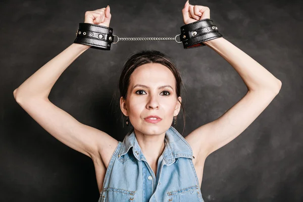 Arrest and jail. Criminal woman prisoner girl in handcuffs — Stock Photo, Image