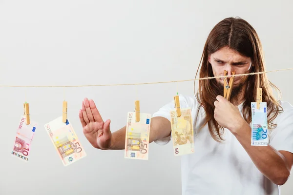 Young man sick of money — Stock Photo, Image