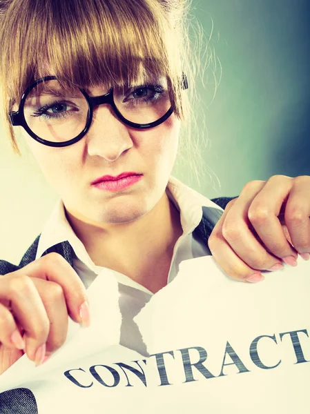 Unhappy business woman showing crumpled contract — Stock Photo, Image