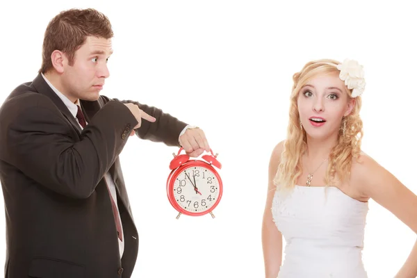 Wedding. Time to get married. Bride groom with clock. Stock Photo