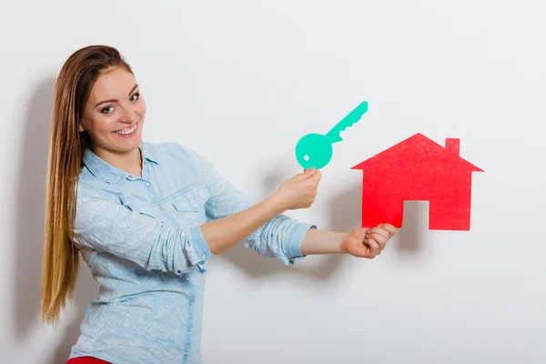 Woman holding  paper house. — Stock Photo, Image