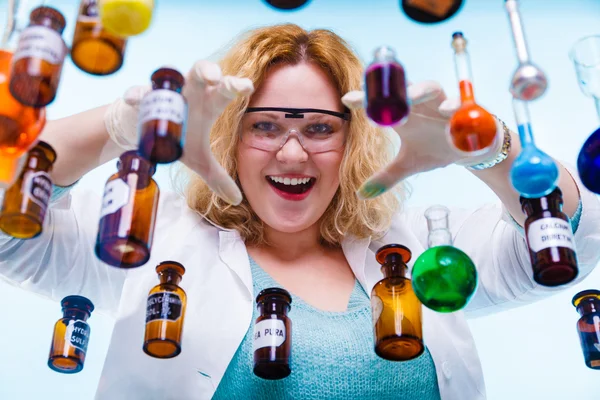 Female chemistry student with glassware test flask. — Stock Photo, Image
