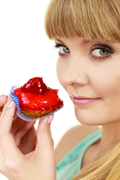 Woman holds cake strawberry cupcake — Stock Photo, Image