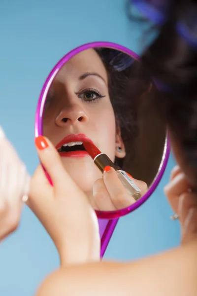 Woman applying red lipstick — Stock Photo, Image